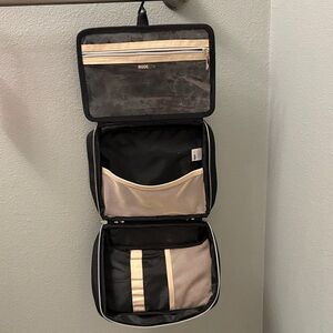 Nudestix Black and Cream Travel Bag